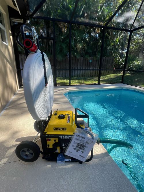 portable gas powered pool wildfire pump standup cart system next to pool